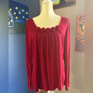 Fashion Bug long sleeve red shirt with rosebuds on neckline. Size L.
